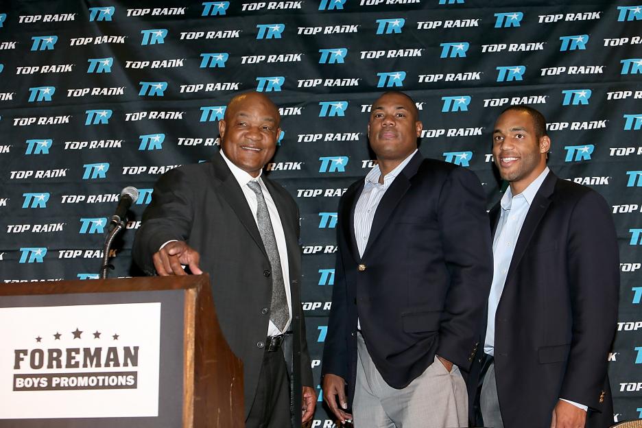 George Foreman and his sons at a press conference announcing Foreman Boys Promotions.