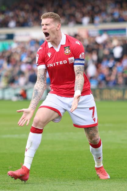 James McClean of Wrexham appeals for a handball.