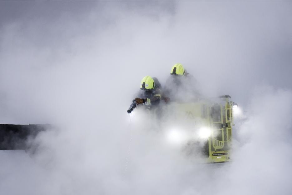 Firefighters extinguishing a fire at Heathrow Airport.