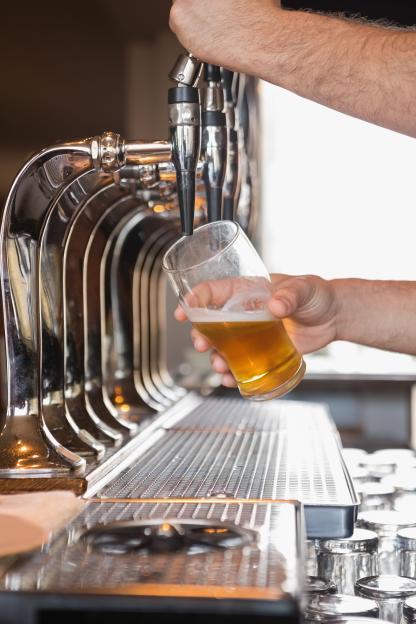 Bartender pouring beer.