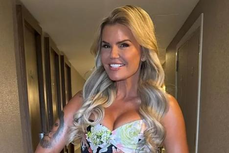 Kerry Katona shows off 2st weight loss in low cut minidress after revealing surgery plans & she ‘trips over her nipples’