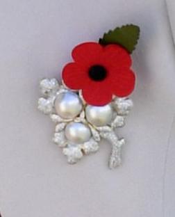 Catherine, Duchess of Cambridge's poppy brooch.
