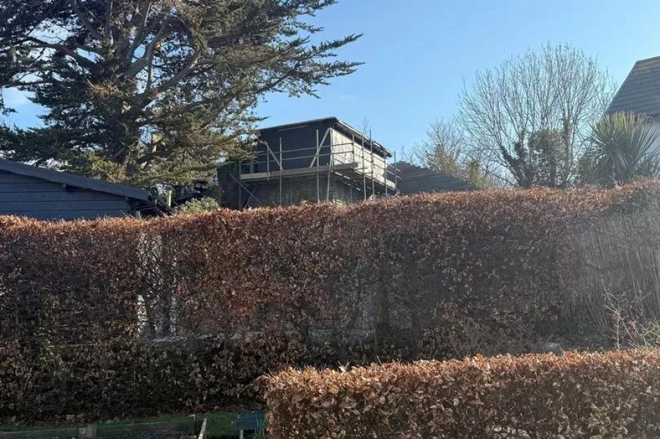 Our neighbour built a ‘monstrous prison camp watchtower’ in his garden that looks right into our daughter’s bedroom