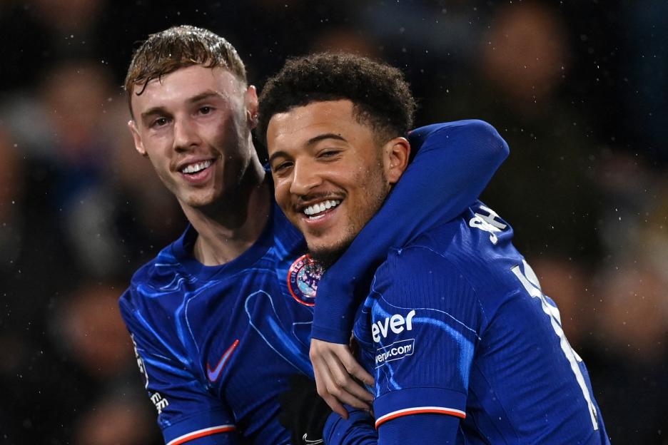 Cole Palmer and Jadon Sancho celebrating a goal.