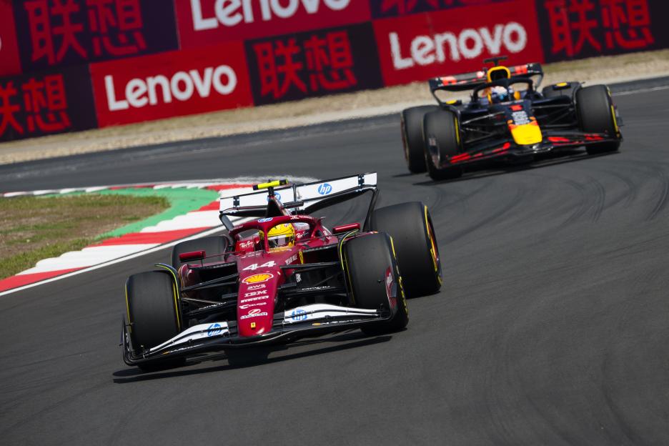 Formula 1 race cars on a track.