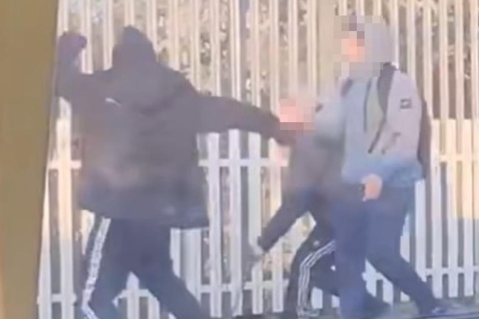 Moment violent thugs armed with foot-long machetes fight on tube station platform in full view of terrified commuters