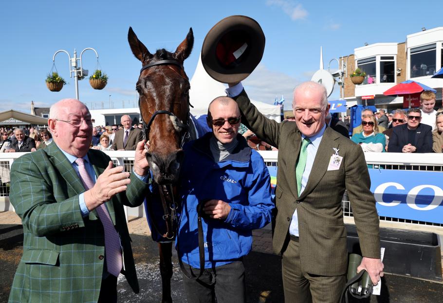 Winning horse Macdermott with trainer and owner.