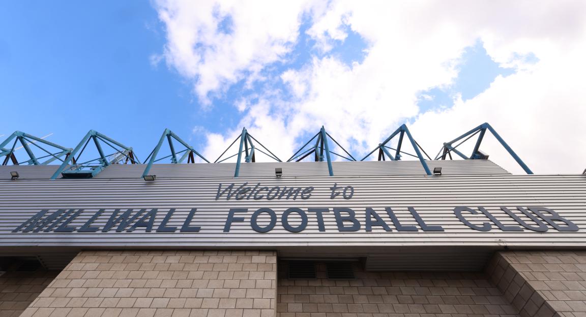 Millwall Football Club sign on stadium exterior.