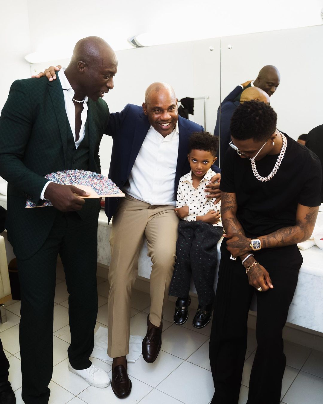 Take a Look at Daddy Wizkid, Zion & Jada in these Sweet Photos from Doha