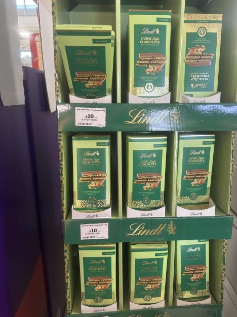 Display of Lindt Dubai Style chocolate bars in a Sainsbury's store.