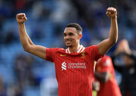Trent Alexander-Arnold celebrating after a soccer match.