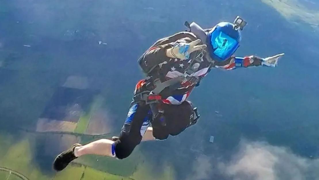 Army skydiver jumps 5,000ft into own wedding… then dances the night away with a broken leg