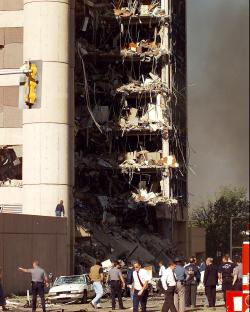 Emergency personnel at the Alfred P. Murrah Federal Building after a bombing.
