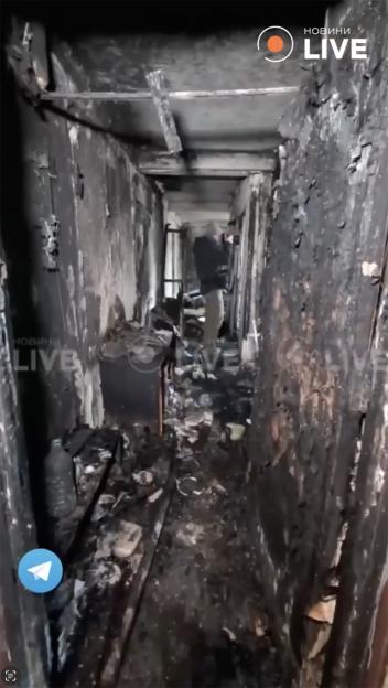 Fire damage inside a building in Kyiv after a drone strike.