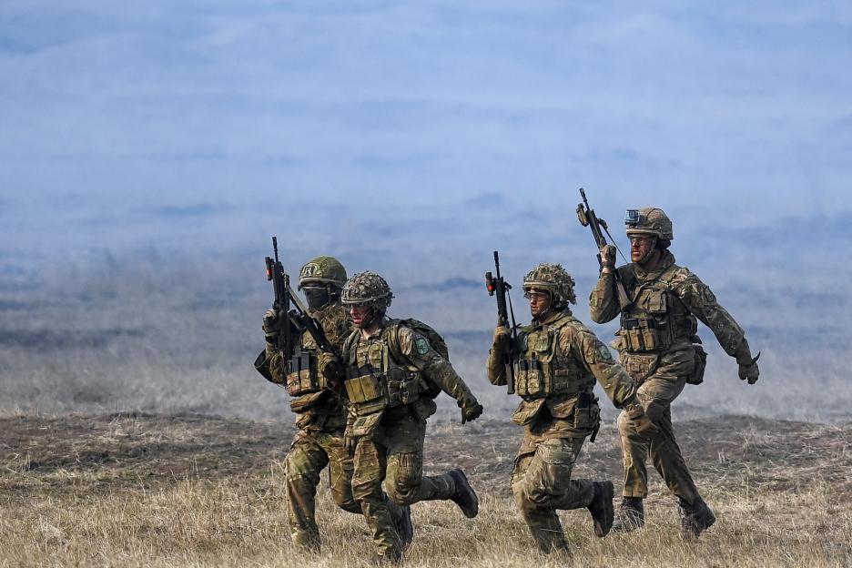 NATO troops participating in a military exercise.