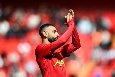 Mohamed Salah warming up before a Liverpool match.