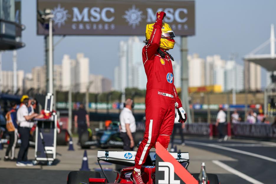 Lewis Hamilton celebrating on the podium at the Formula 1 Heineken Chinese Grand Prix.